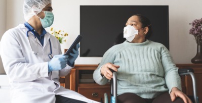 Doctor and patient both wearing masks