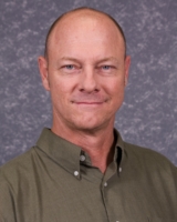 Headshot of Paul Monaghan.